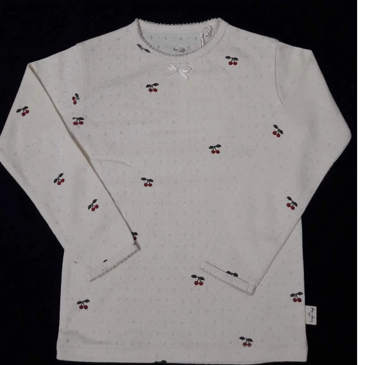 Babywear top sample showing printed pointelle long sleeve t-shirt